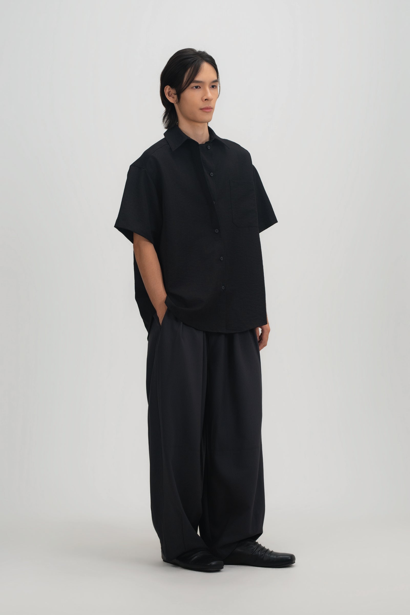 Gender Neutral Drape Neck Short-Sleeve Shirt (Black)