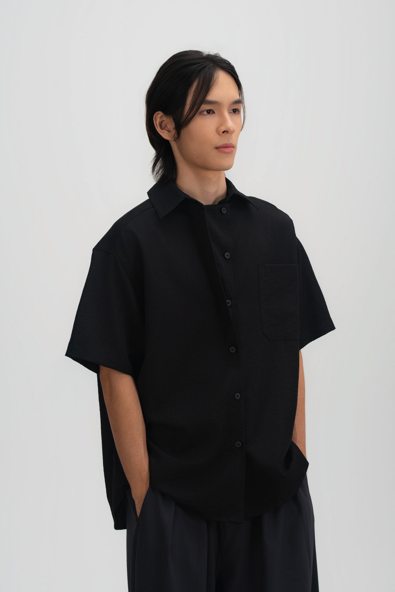 Gender Neutral Drape Neck Short-Sleeve Shirt (Black)