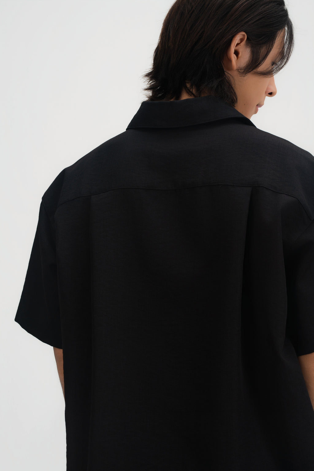 Gender Neutral Drape Neck Short-Sleeve Shirt (Black)