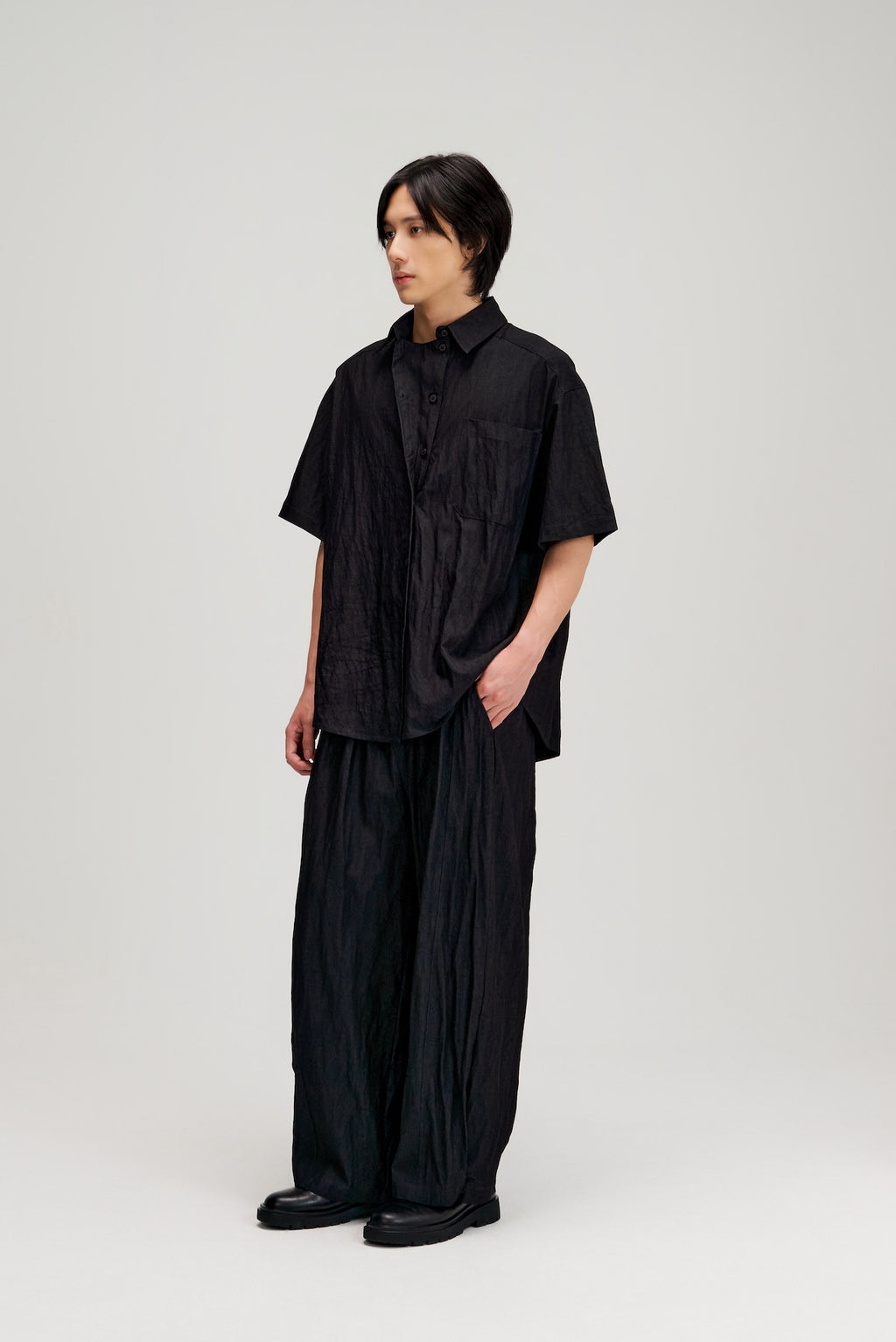 Gender Neutral Drape Neck Short-Sleeve Shirt (Black)