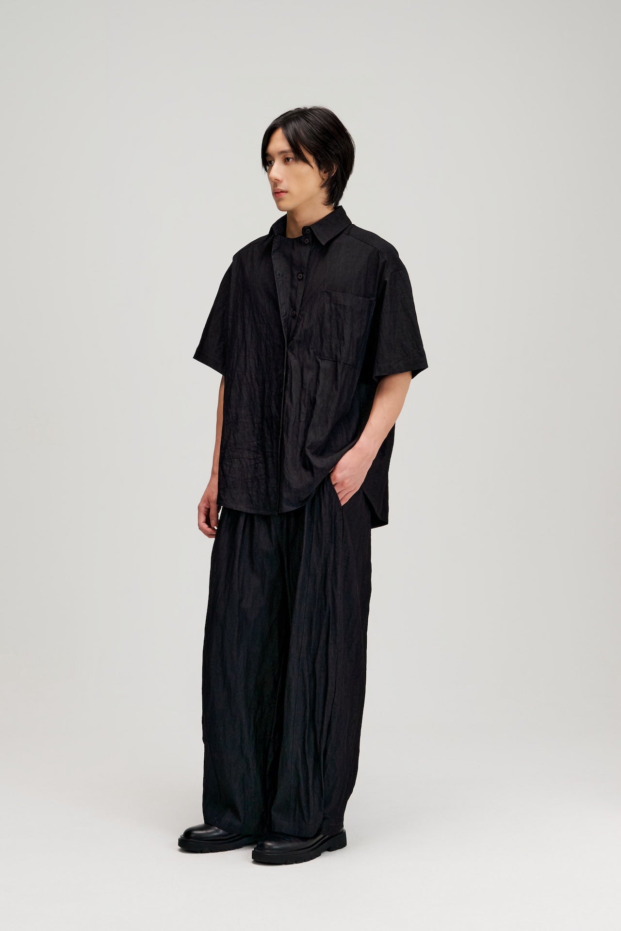 Gender Neutral Drape Neck Short-Sleeve Shirt (Black)