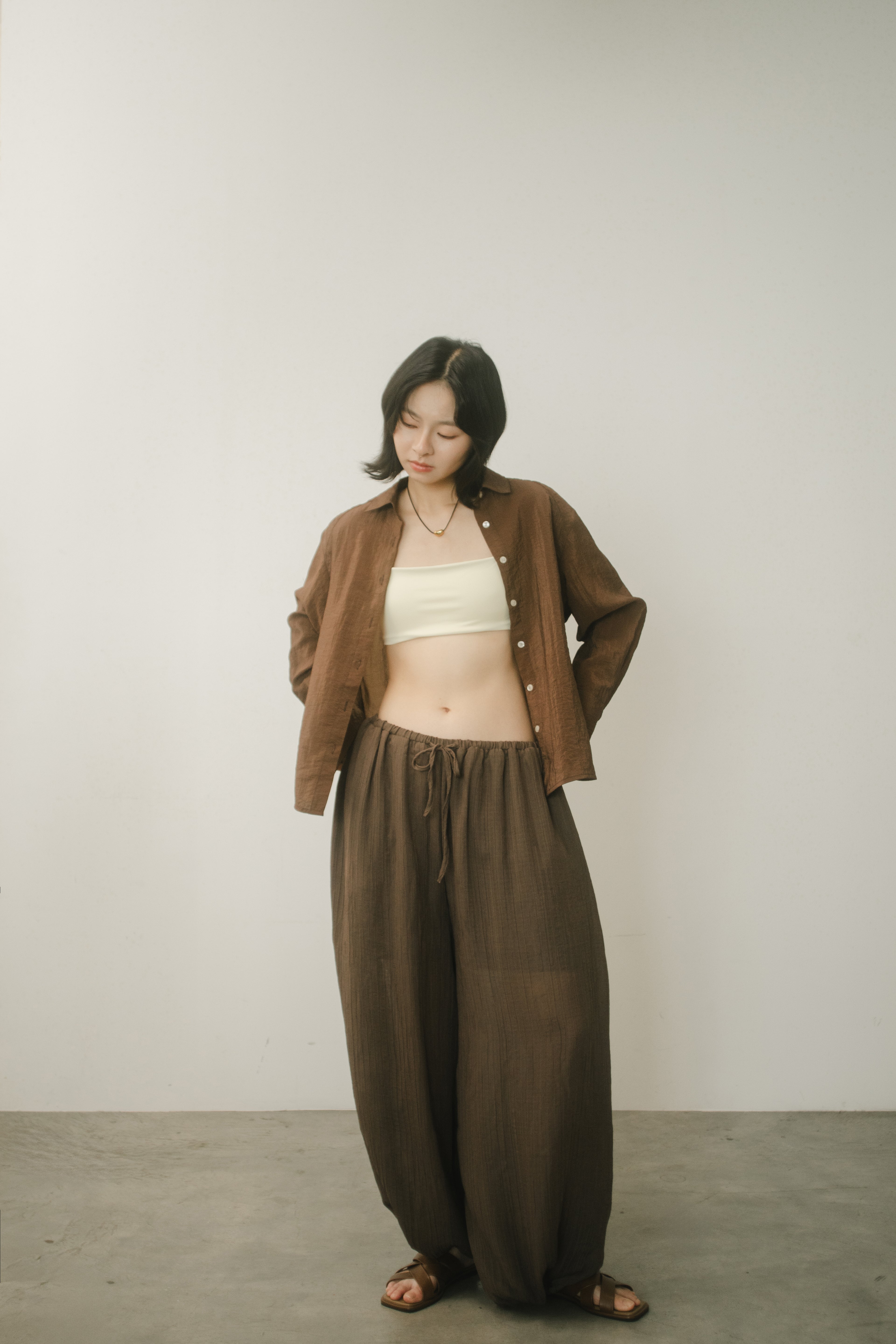 WES x GUNG x SO | Easy Shimmer U-Hem Blouse (Brown)