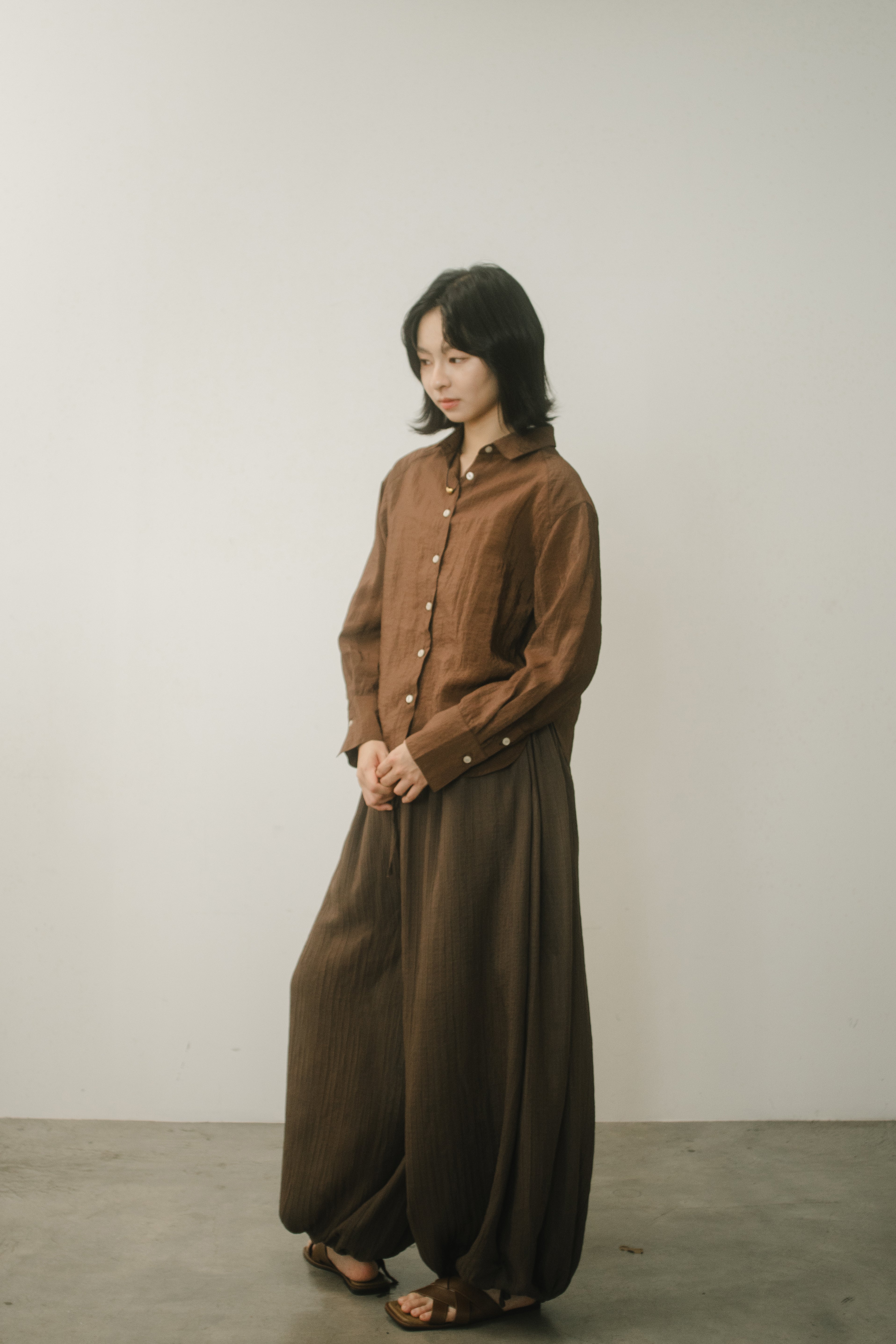 WES x GUNG x SO | Easy Shimmer U-Hem Blouse (Brown)