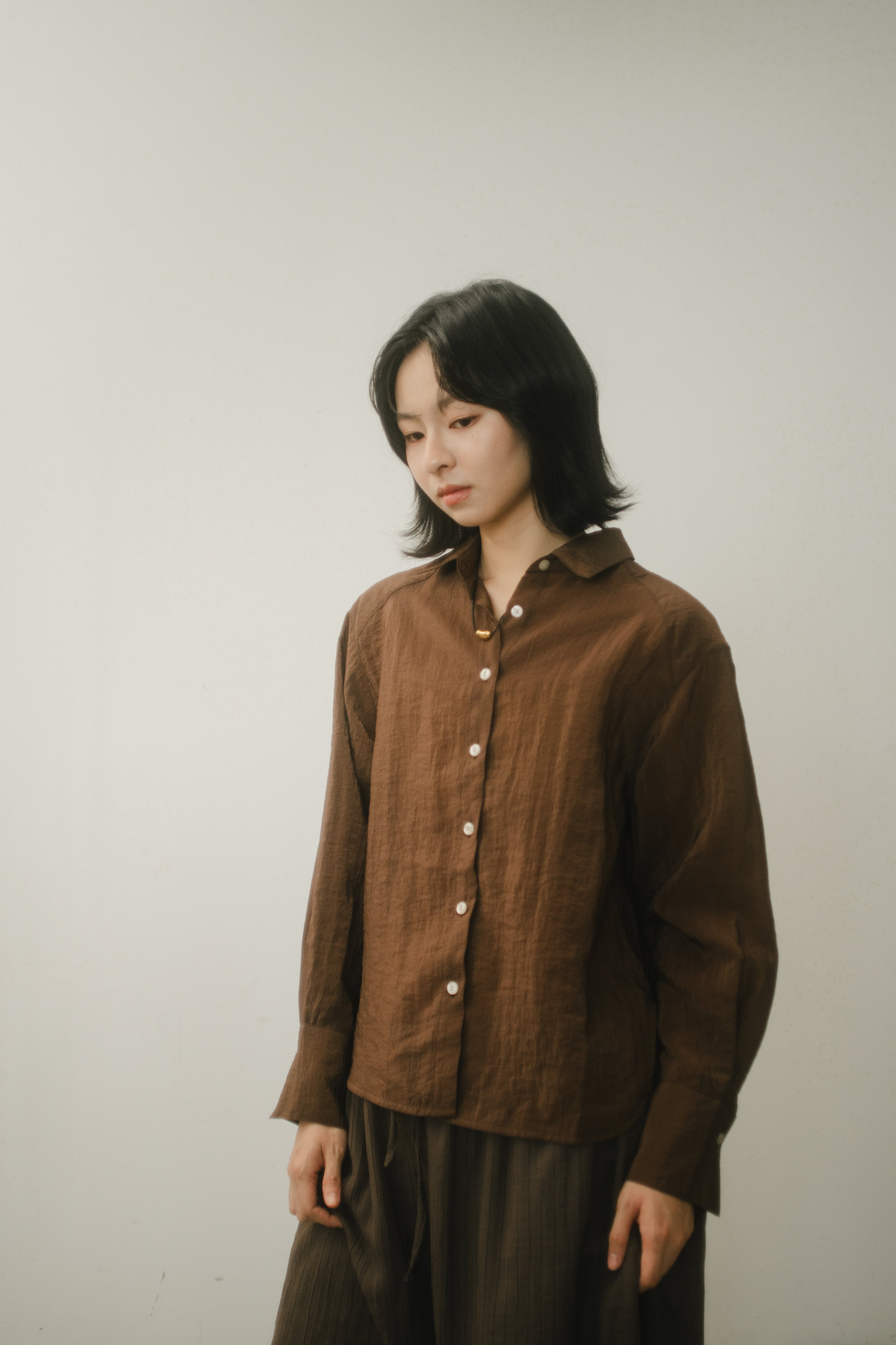 WES x GUNG x SO | Easy Shimmer U-Hem Blouse (Brown)