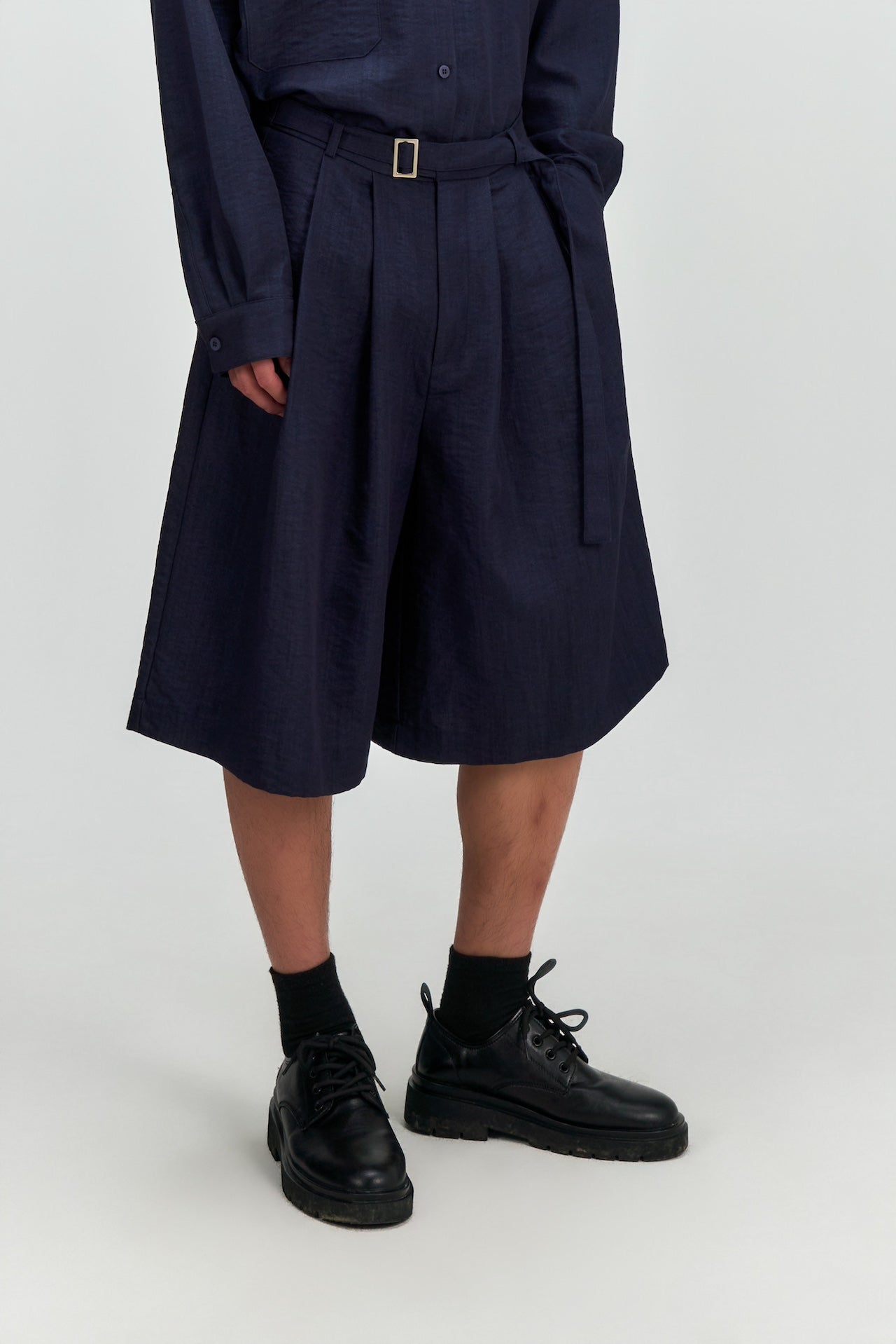 Gender Neutral Pleated Belted Shorts (Navy)