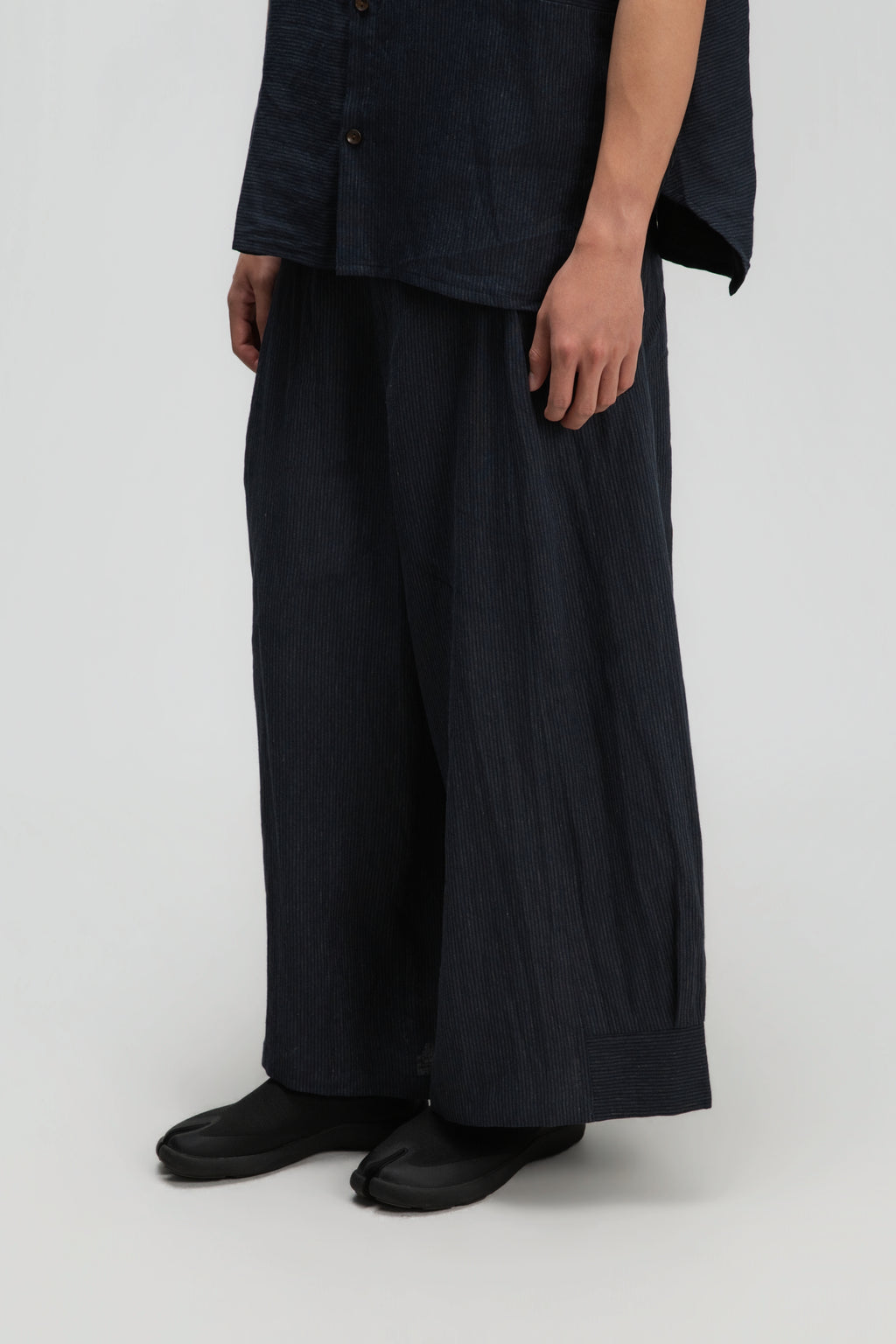 Gender Neutral Pleated Hem Ankle Pants (Navy Blue Stripe)
