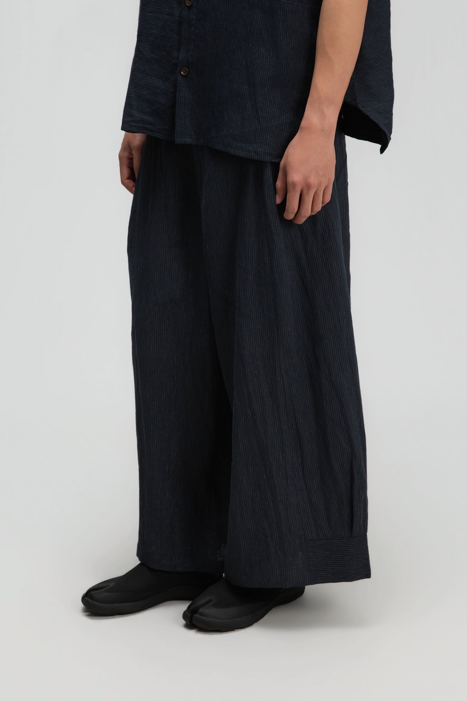 Gender Neutral Pleated Hem Ankle Pants (Navy Blue Stripe)